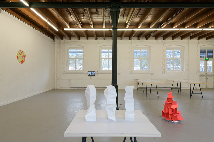 Installation view Club Solo, Breda, 2018, ground floor with left to right:<br /> wallpainting 'Homage to the Soul (Min Suk Kim)', video 'studioview April 22 through June 11, 2014' and<br /> sculptures ' Sending Out The  Gods' and 'Smoking Shaman Mrs. Choi'. - Click image to continue.